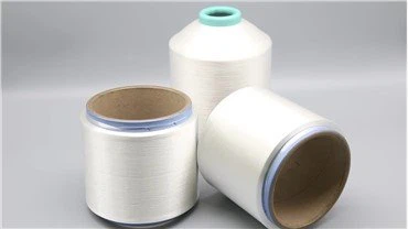 Elastisk, smeltende garn i nylon